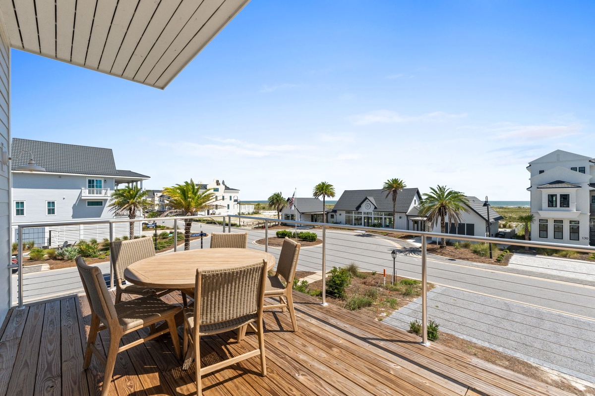 This coastal community features modern beach homes with classic architecture. Palm trees line the quiet streets, and the property offers easy access to nearby waterfront areas and local amenities.