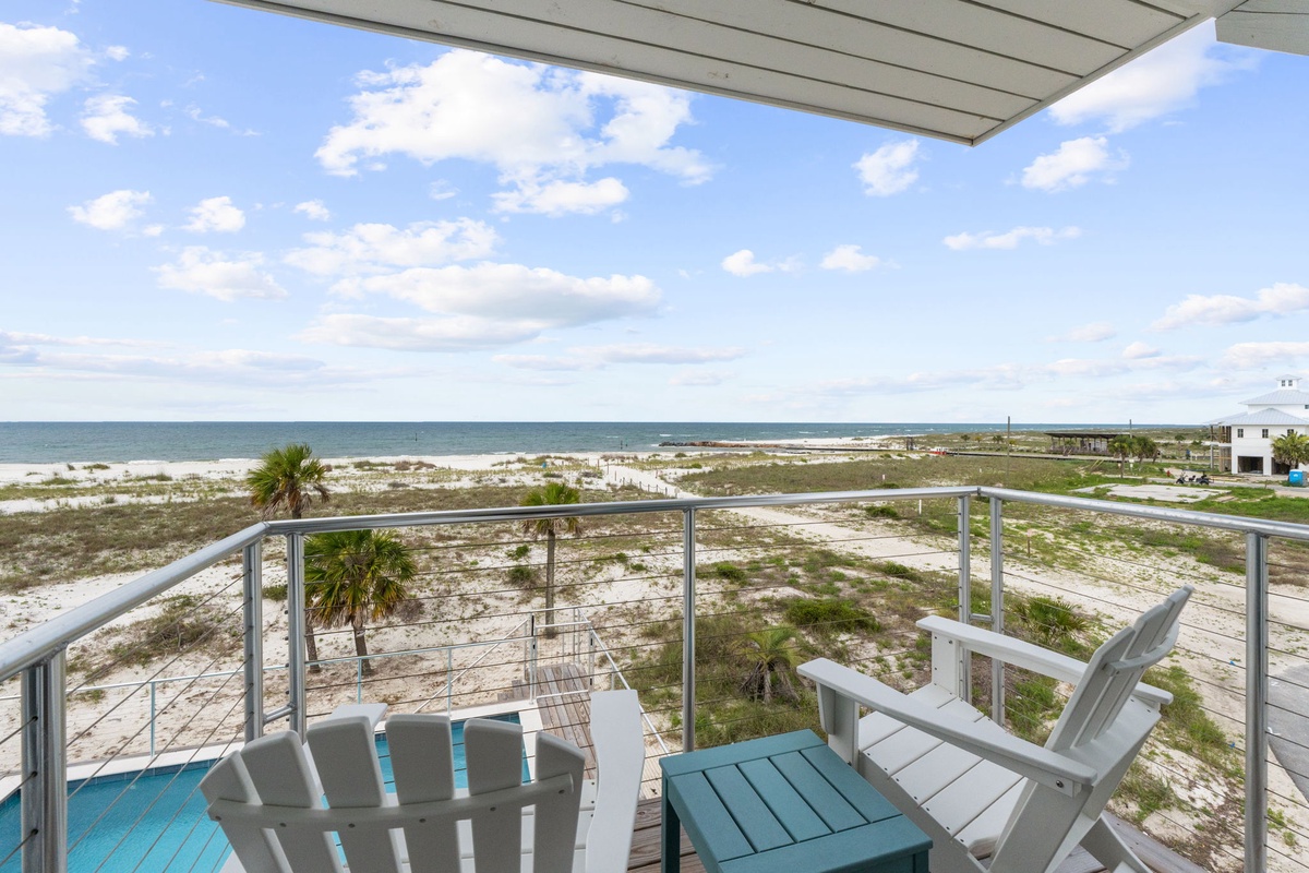 Settle into your private balcony with sweeping views of the Gulf Coast stretching endlessly before you, where soft coastal breezes and gentle waves create your perfect seaside escape.