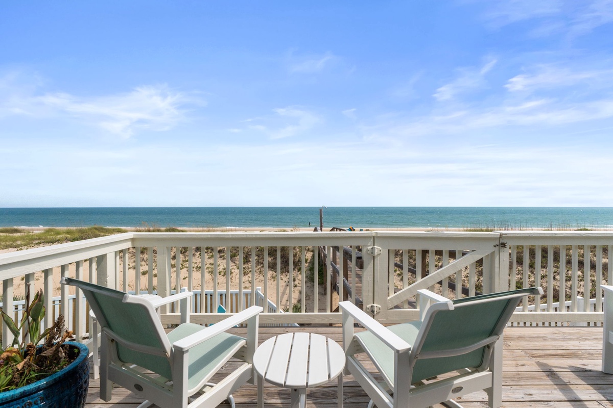 Step out onto your private deck and settle into a comfortable lounge chair, where the turquoise sea stretches endlessly before you and gentle ocean breezes invite pure relaxation.