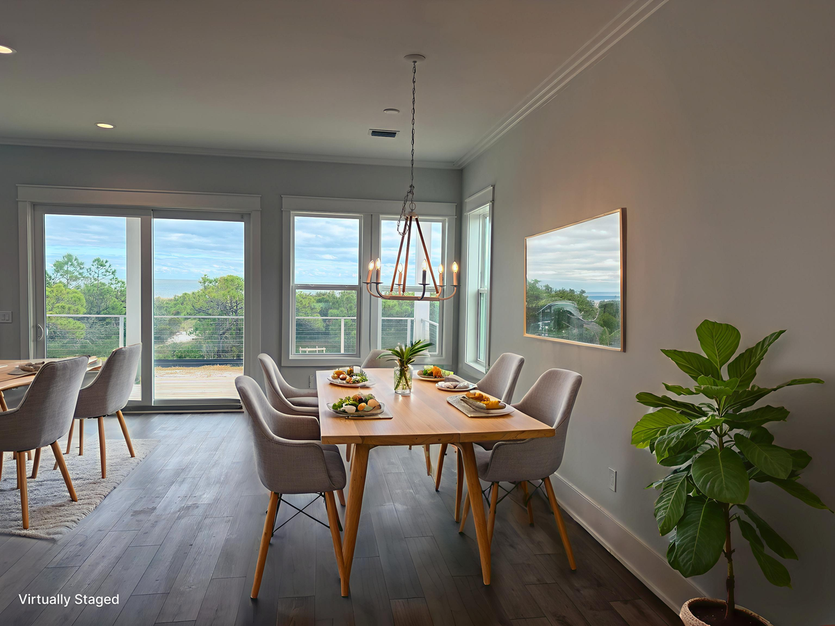 Gather around your elegant dining table where warm lighting and scenic views create perfect moments for memorable meals together.