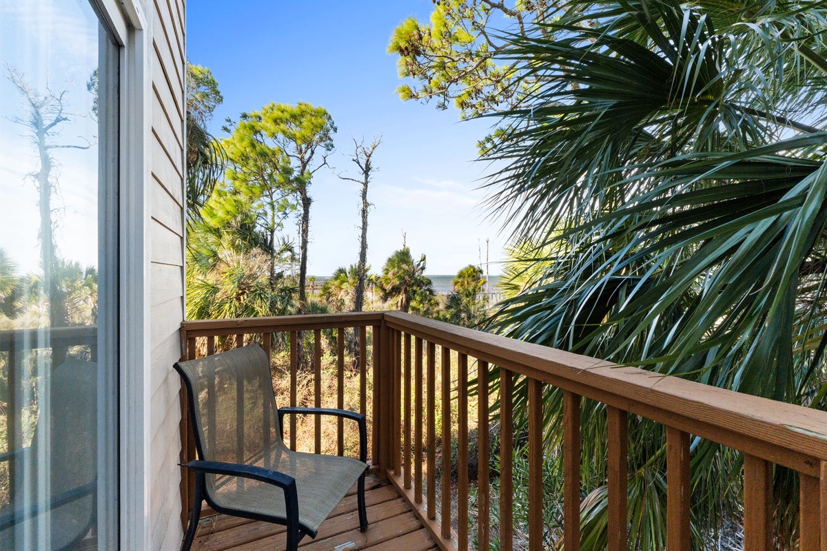 Sip your morning coffee while taking in tropical views from your private balcony surrounded by swaying palms.