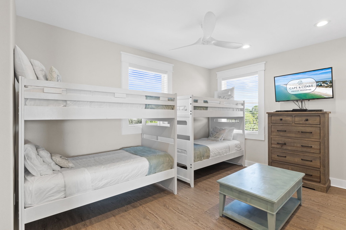 Your kids will love this bright bedroom with twin bunk beds, perfect for creating magical vacation memories together.