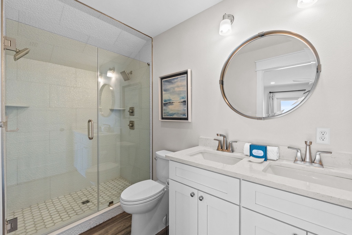 Refresh in your private bathroom with a spacious walk-in shower, dual sinks, and modern finishes that make getting ready feel effortless.