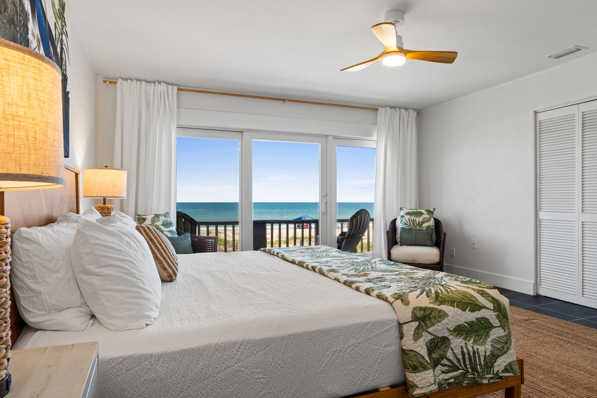 Wake up to stunning ocean views from your comfortable bed—the perfect beach escape awaits right outside your balcony doors.