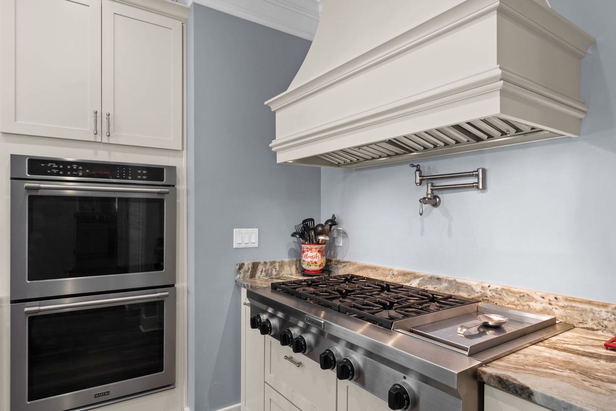 Your gourmet kitchen features professional-grade appliances and elegant granite countertops, perfect for creating memorable meals during your stay.