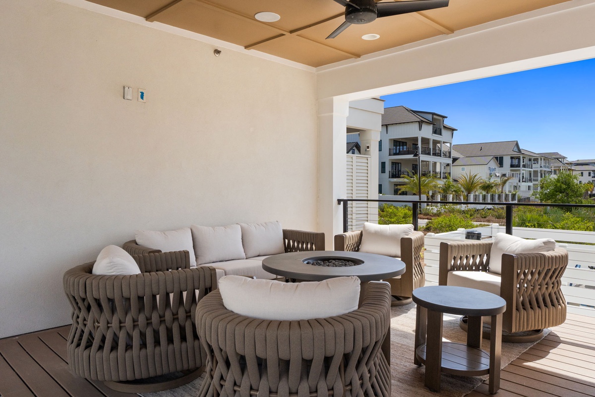 Unwind on your private terrace with designer seating and stunning neighborhood views.