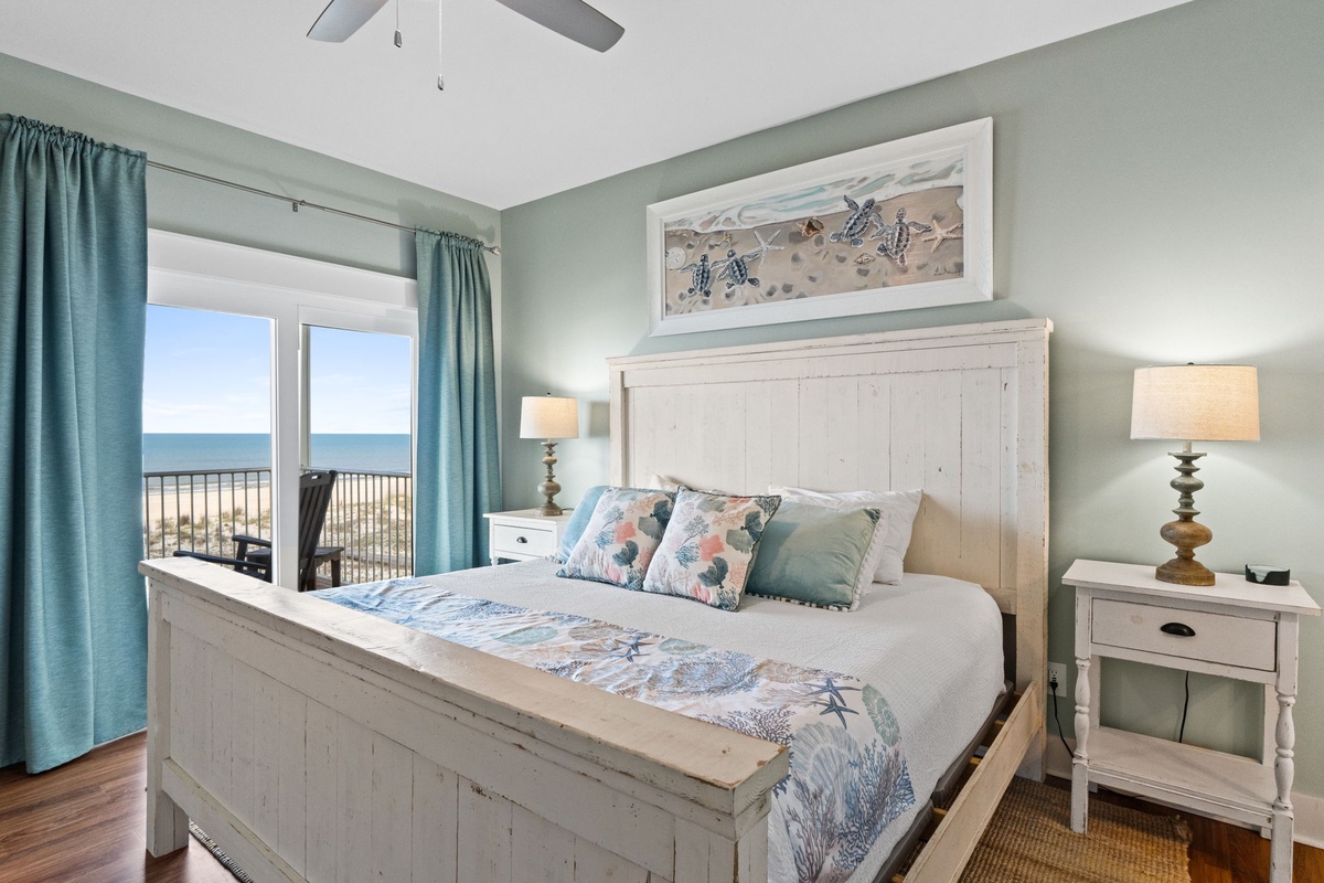 Wake up to stunning ocean views from your serene coastal bedroom, where soothing colors and beach-inspired decor create your perfect seaside retreat.