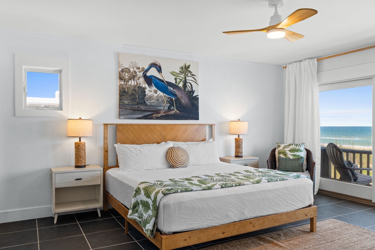 Wake up to stunning ocean views framing your plush bed. The soft tropical breezes from your private balcony and calming coastal decor invite you to fully unwind and embrace seaside serenity.