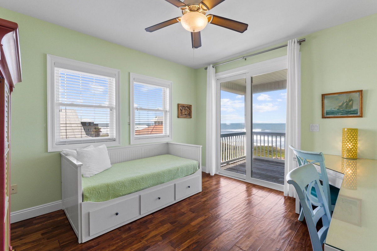 Open the glass doors and step onto your private balcony overlooking the sparkling ocean. This peaceful retreat invites you to unwind with calming sea breezes and coastal views right from your room.