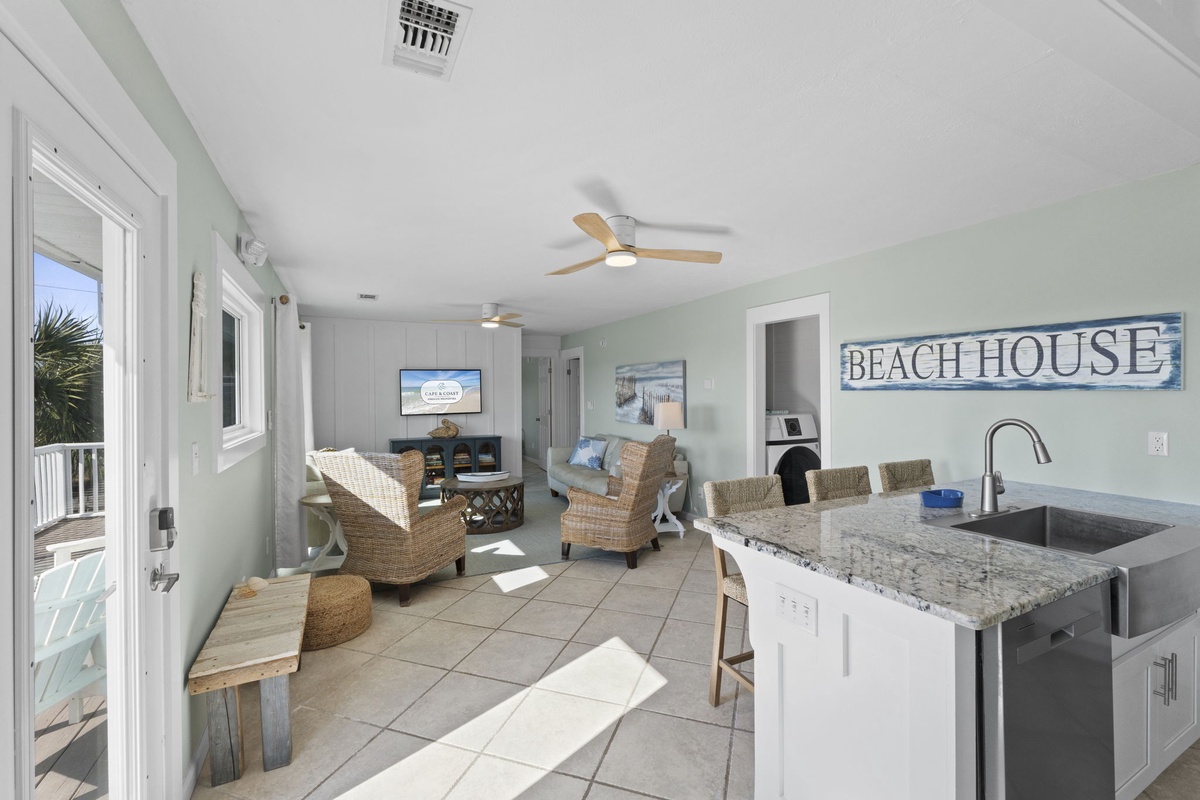 An open-concept layout seamlessly connects the kitchen and living space, creating an easy flow for gathering and relaxing.