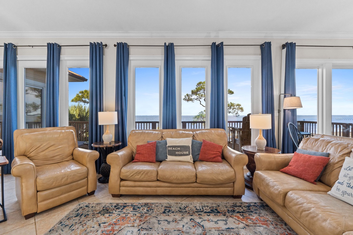 Sink into buttery leather seating while ocean breezes drift through your expansive windows, creating the perfect beachside retreat.