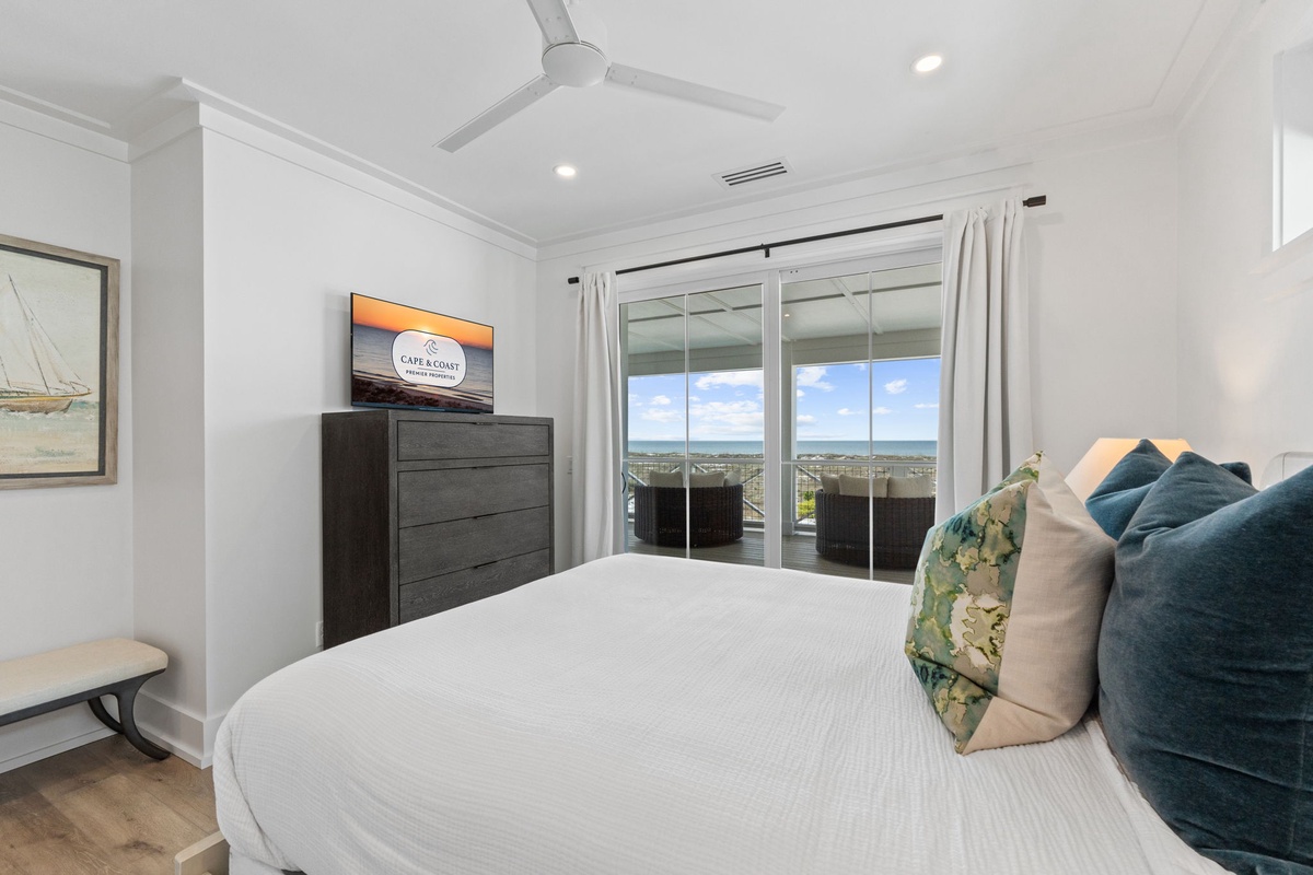 Wake up to stunning views from your private bedroom sanctuary with premium bedding and ocean vistas through floor-to-ceiling windows.
