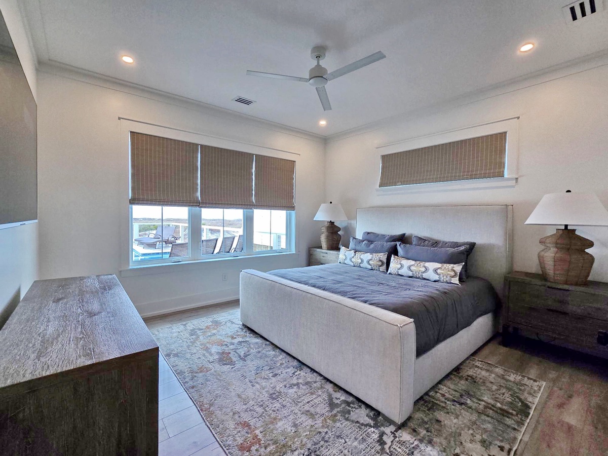 Drift off peacefully in your serene bedroom, where soft linens and gentle harbor views create the perfect retreat after exploring.