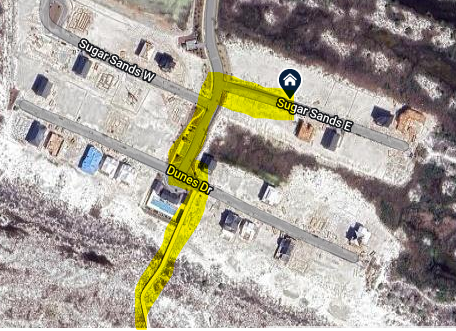 Beach access via community boardwalk.