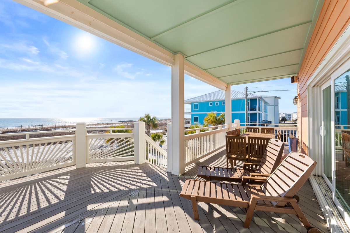 Unwind on your private deck overlooking the beach, where coastal breezes and ocean views create the perfect spot for morning coffee or sunset relaxation.