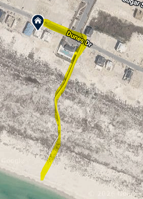 Aerial view showing the property location just steps away from community boardwalk.