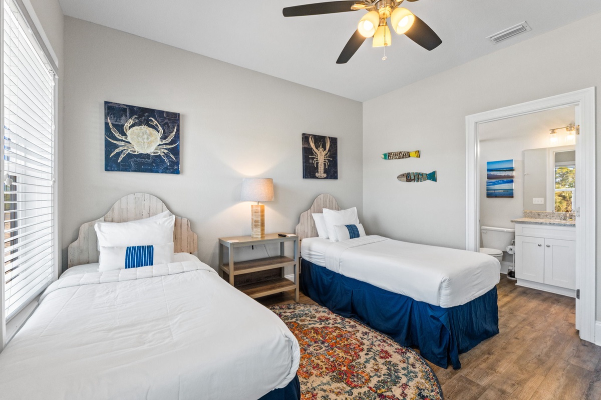 Drift off to sleep in your charming twin bedroom with nautical artwork and soft linens.