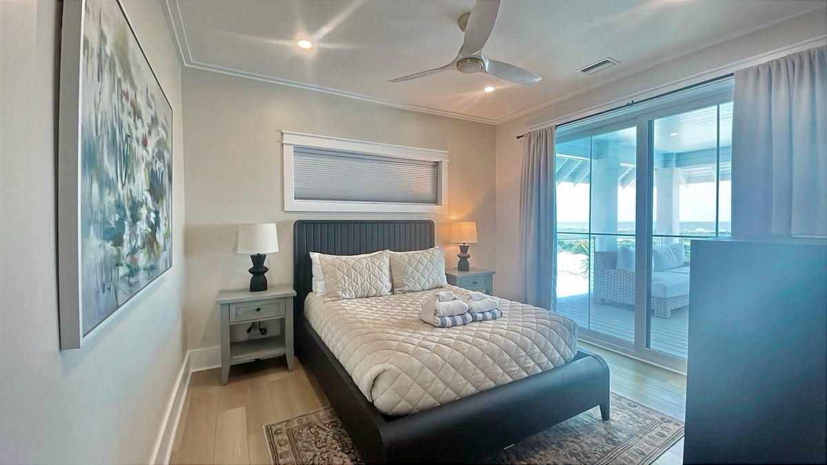 Slip into crisp linens and wake to coastal breezes through your private balcony doors—your peaceful beachside haven awaits.