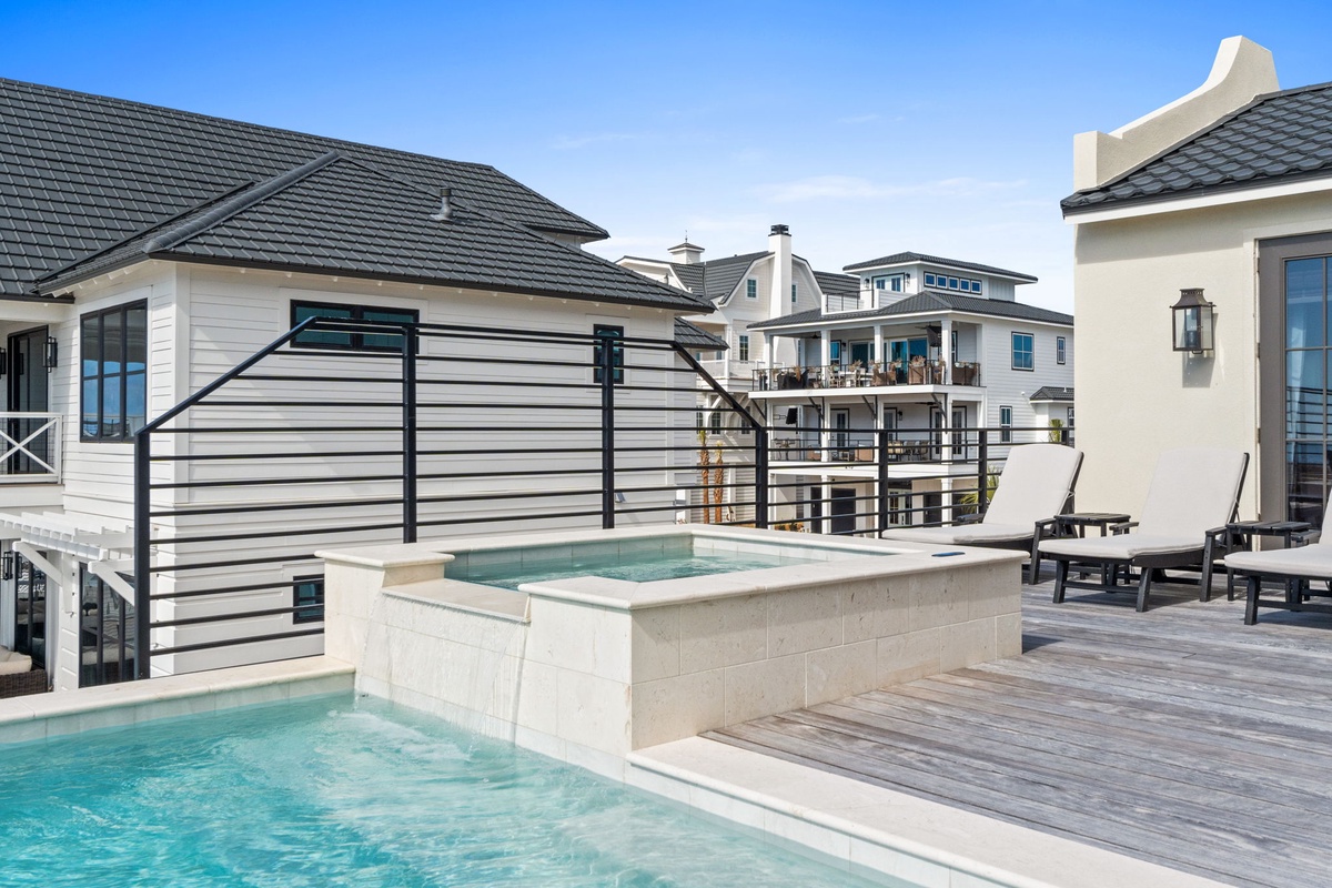 Soak in your private rooftop hot tub while enjoying stunning neighborhood views from this elevated outdoor terrace.