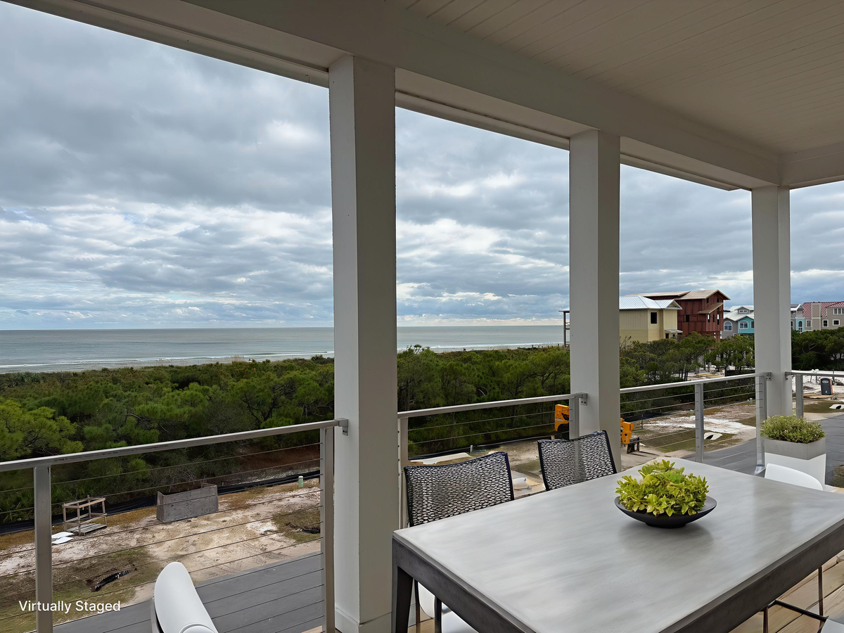 Breathtaking ocean views from your covered balcony, where morning coffee tastes better with endless sea vistas and gentle coastal breezes.