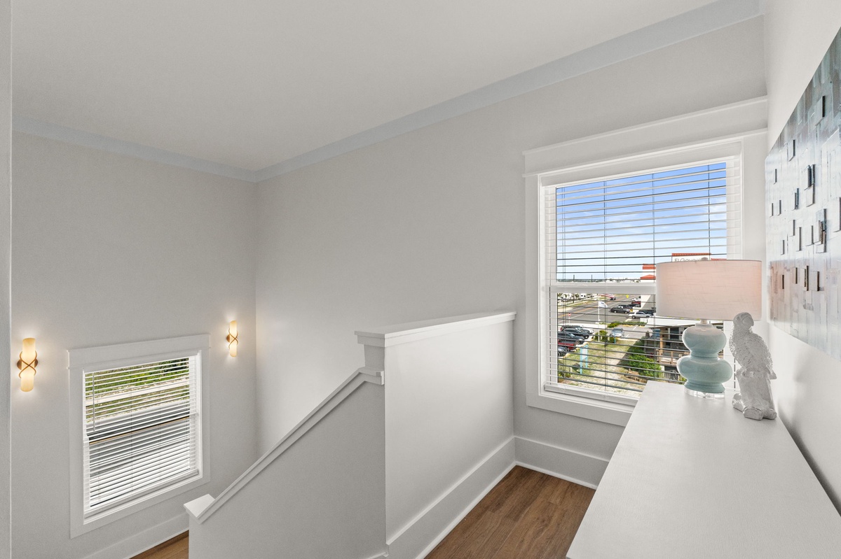 Bright natural light fills this clean, modern space where you'll find peaceful views and thoughtful details like soft accent lighting to welcome you home.