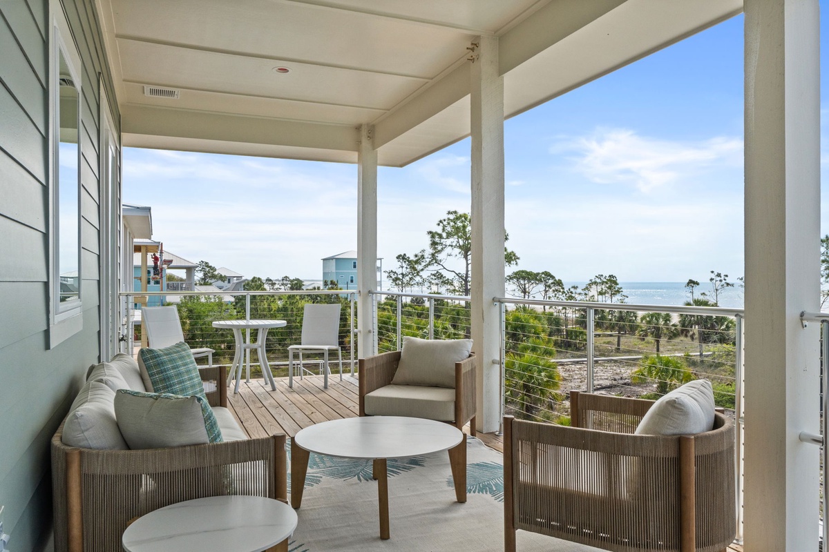 Your private covered terrace offers the perfect spot to sip morning coffee while soaking in panoramic ocean views.