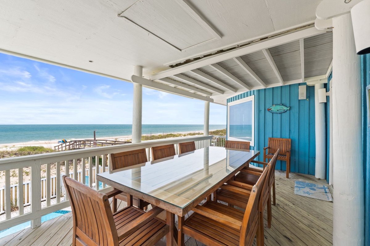 Step out onto your private balcony and take in breathtaking oceanfront views. The covered dining area invites you to enjoy meals with the sound of waves and sea breeze as your backdrop.