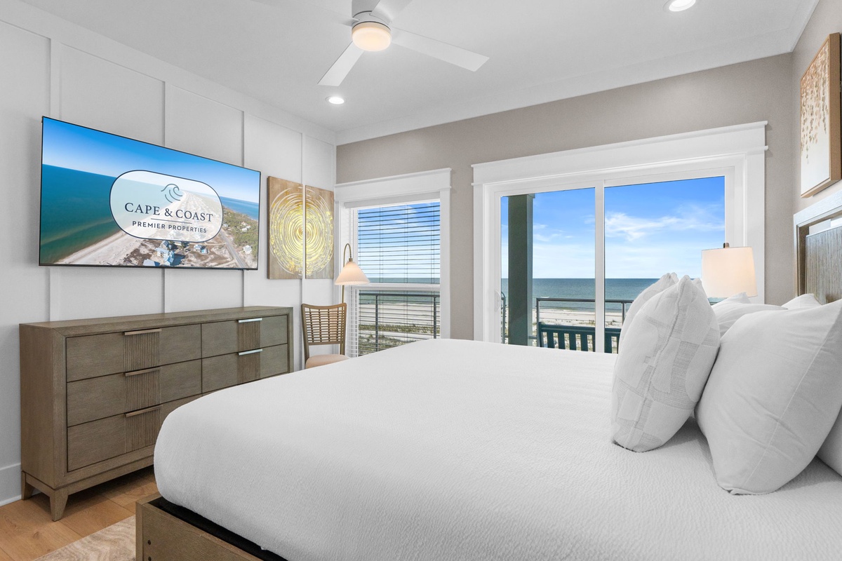 Wake up to stunning ocean views from your plush bed, with gentle sea breezes and morning light pouring through your private balcony doors.