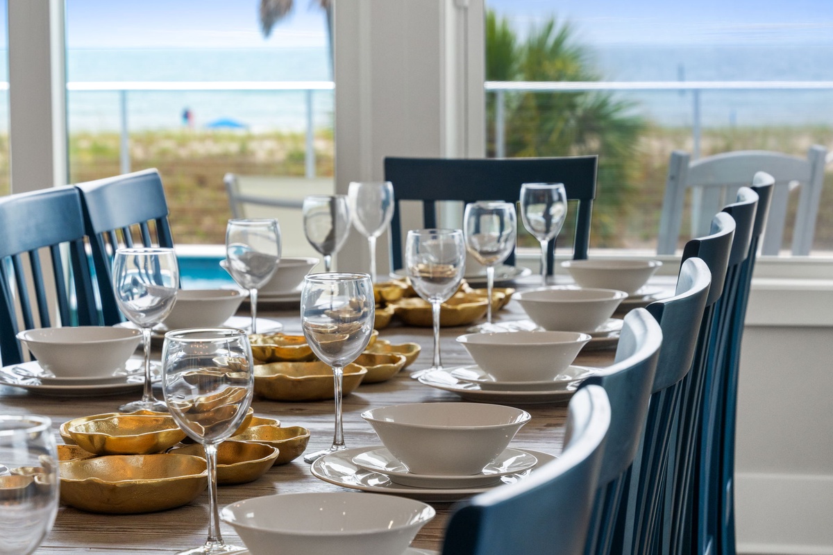 Gather around your dining table with a stunning beachfront view. Sunlit meals here come with the sounds of waves and glimpses of palm trees swaying in the coastal breeze.