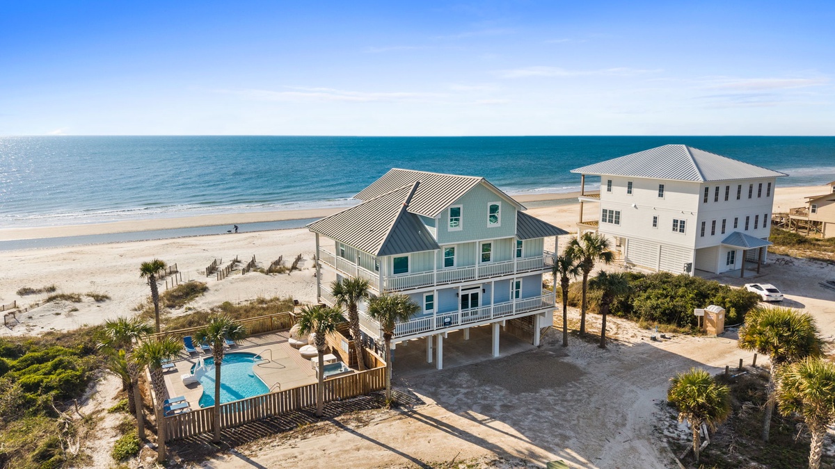 Stunning beachfront vacation rental with private pool and direct beach access in a pristine coastal setting.