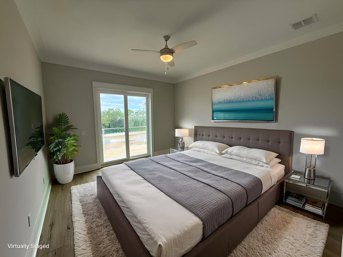 Relax in your elegantly appointed bedroom with plush linens, modern furnishings, and serene artwork creating your perfect retreat.