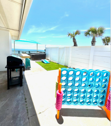 Your private balcony features a BBQ grill, outdoor games, and sunny skies—perfect for meals and fun in the fresh air.