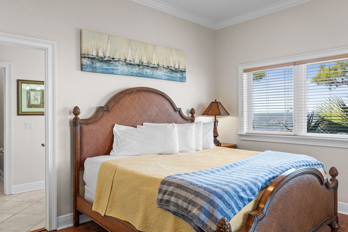 Drift off in your coastal bedroom where nautical charm meets comfort with soft linens and seaside artwork.