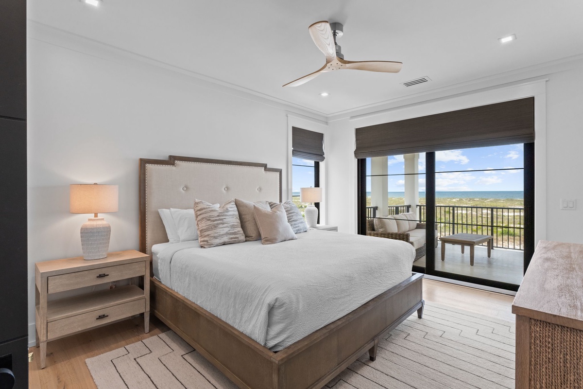 Sink into this plush bed and wake to stunning natural vistas through your private balcony doors. Your peaceful retreat features modern comfort and expansive views that invite total relaxation.