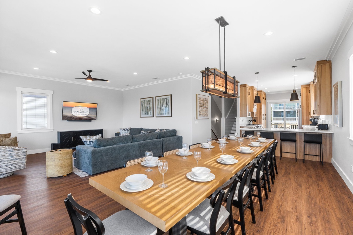 Gather around your spacious dining table for memorable meals, with the warm kitchen and cozy living room creating the perfect setting for quality time.