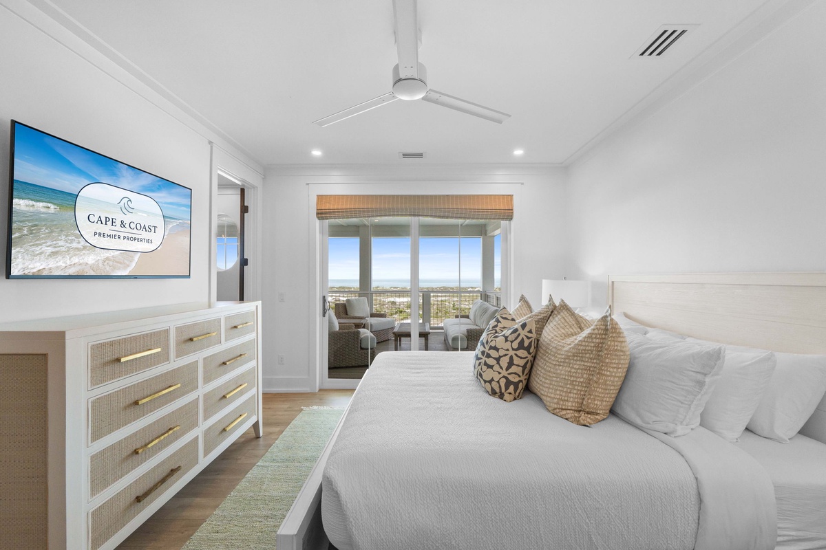 Wake up to serene coastal views from your beautifully appointed bedroom, where soft linens and peaceful décor invite you to unwind. Step outside through your private balcony to breathe in the fresh air.