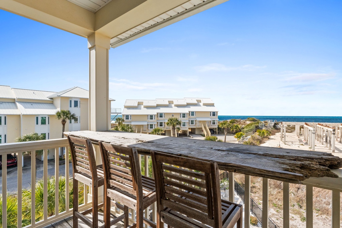 Enjoy morning coffee on your private balcony with stunning ocean views and coastal breezes.