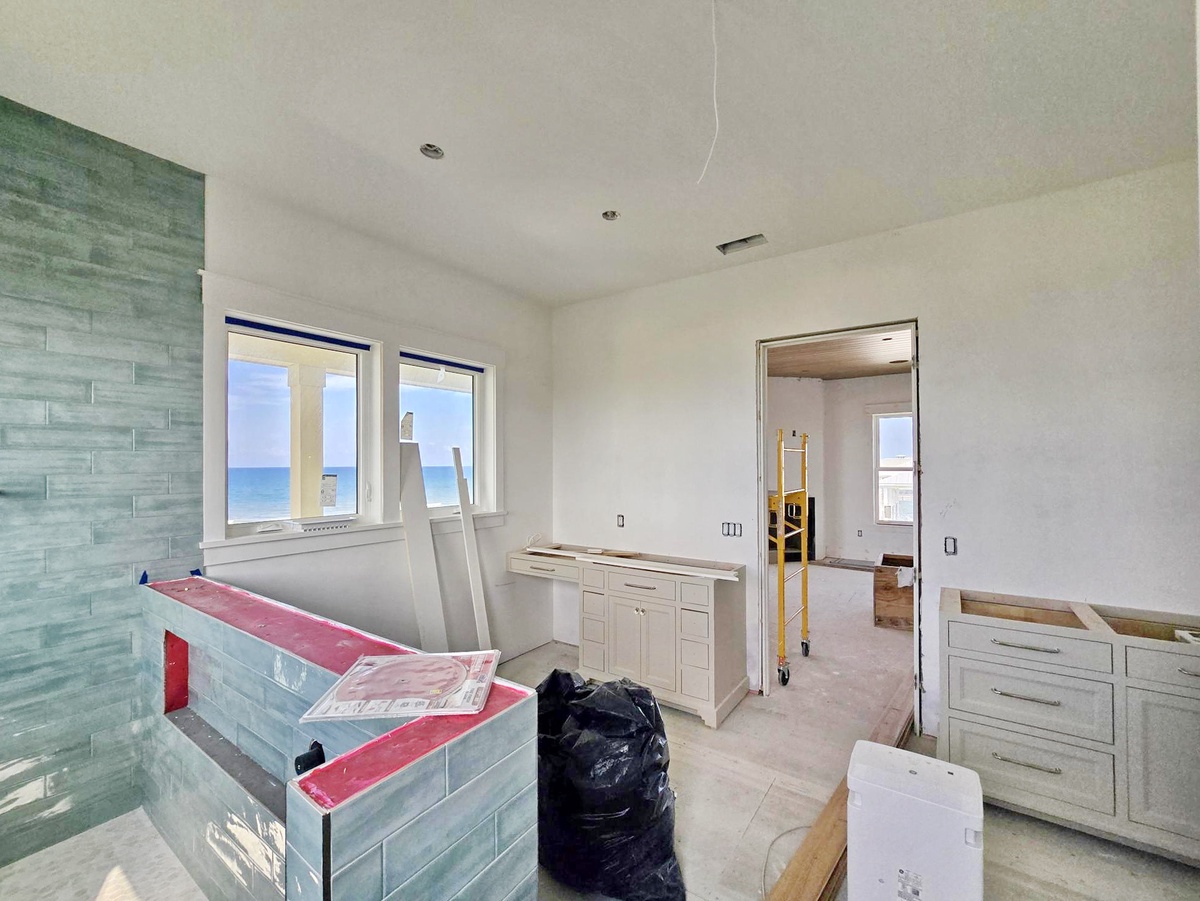This property is currently under construction to bring you modern luxury. Ocean views frame the bright space through dual windows, promising a finished retreat where your dream beachside escape awaits.