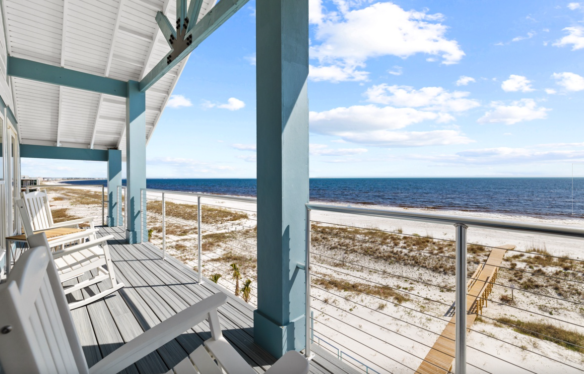 Step onto your private oceanfront balcony and breathe in the salty air while watching waves dance across pristine sand.