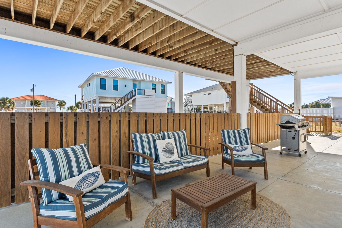 Your covered patio offers a relaxing retreat with comfortable seating and BBQ facilities for memorable outdoor dining experiences.