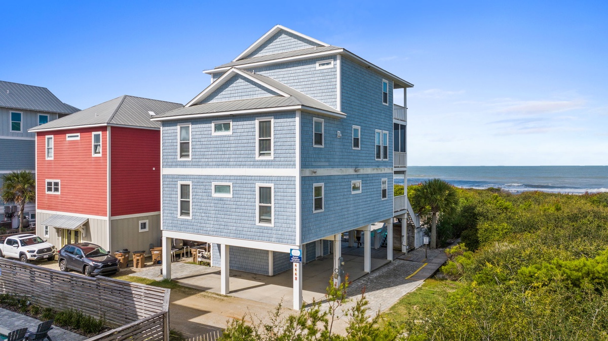 This coastal retreat sits just steps from the beach, offering an ideal setting for your seaside getaway with stunning ocean access and natural beauty surrounding the property.