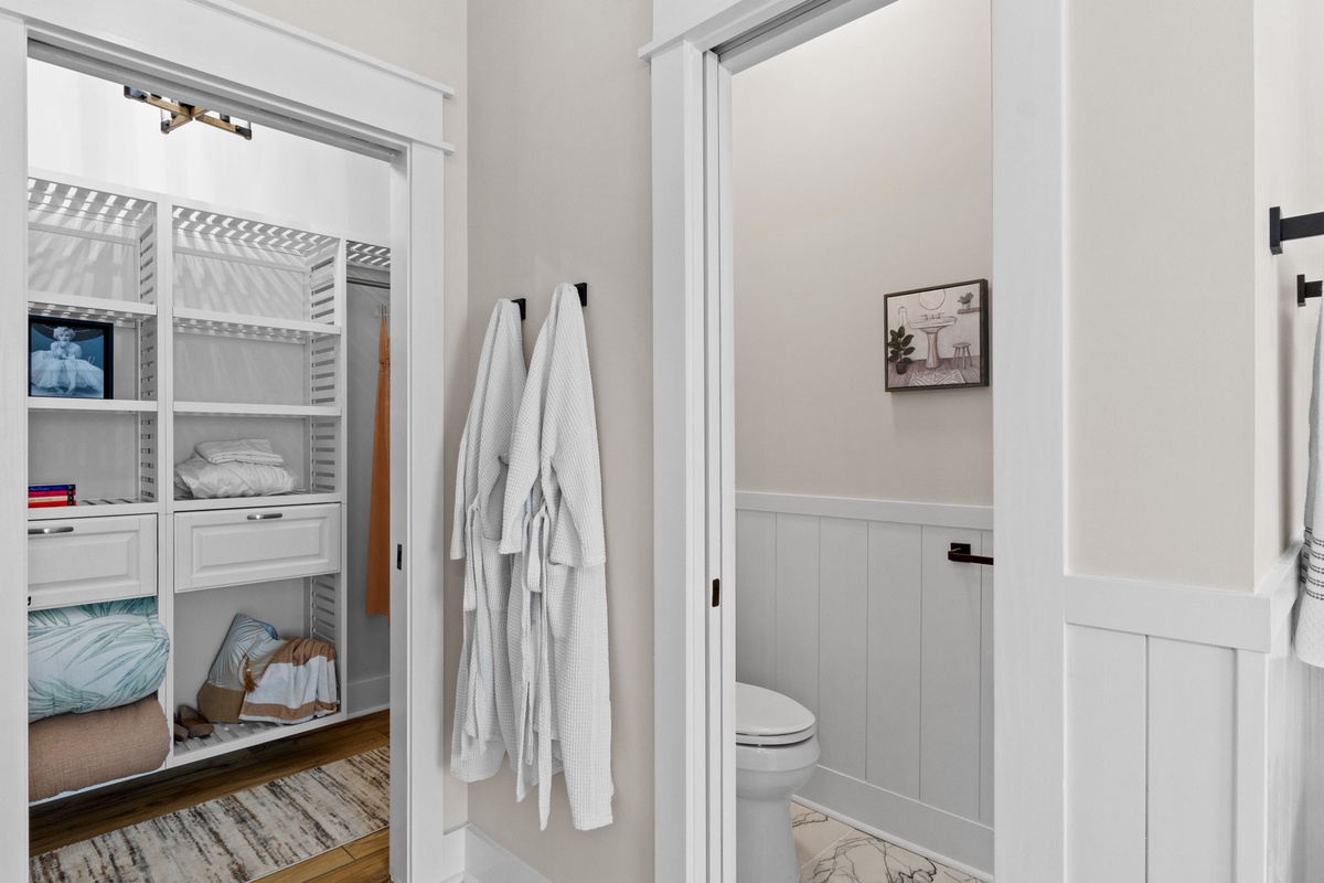 A cozy bunk room with fresh linens and a private bathroom just steps away—perfect for families traveling together.