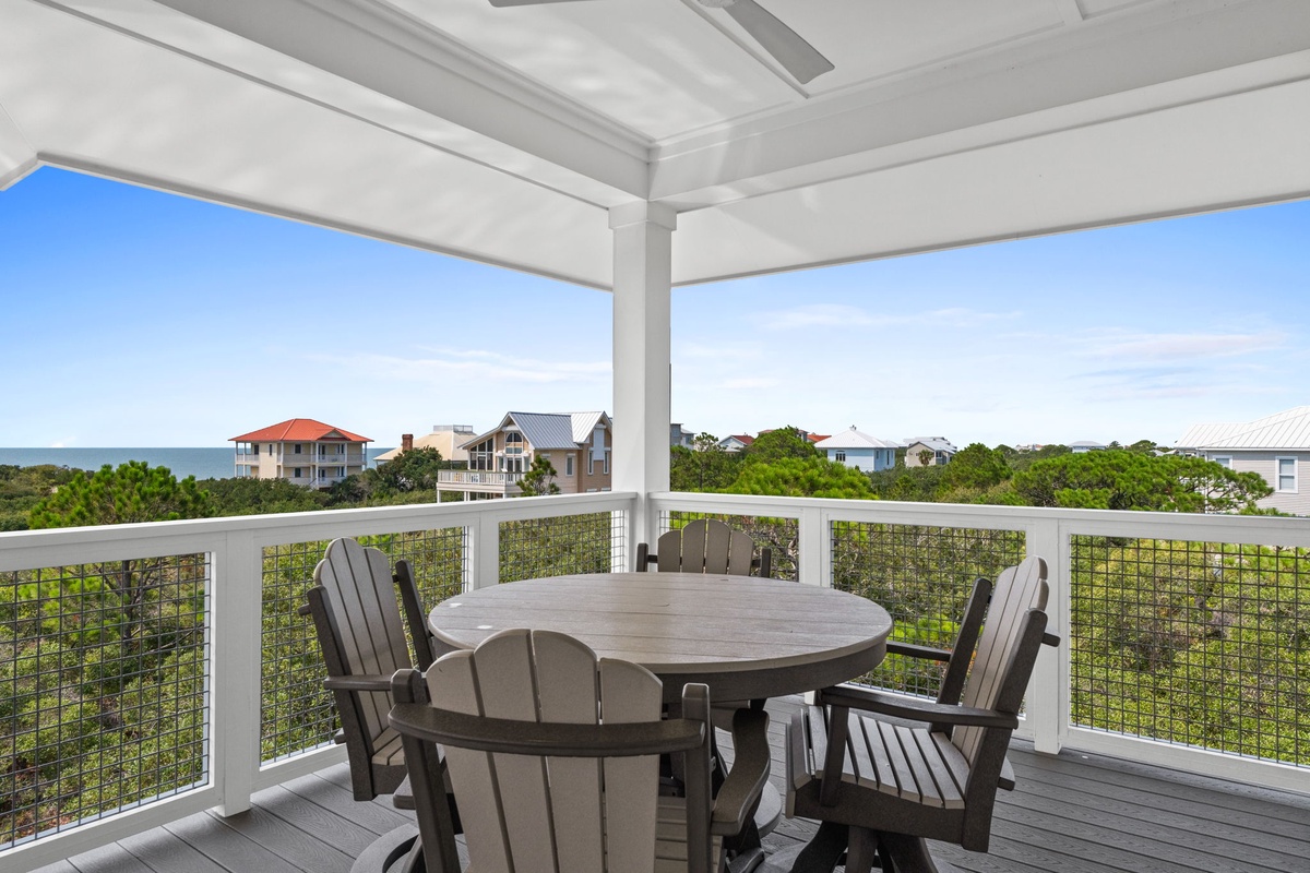 Sip your morning coffee at your private table and breathe in the salt air while gazing at the sea beyond lush coastal greenery.