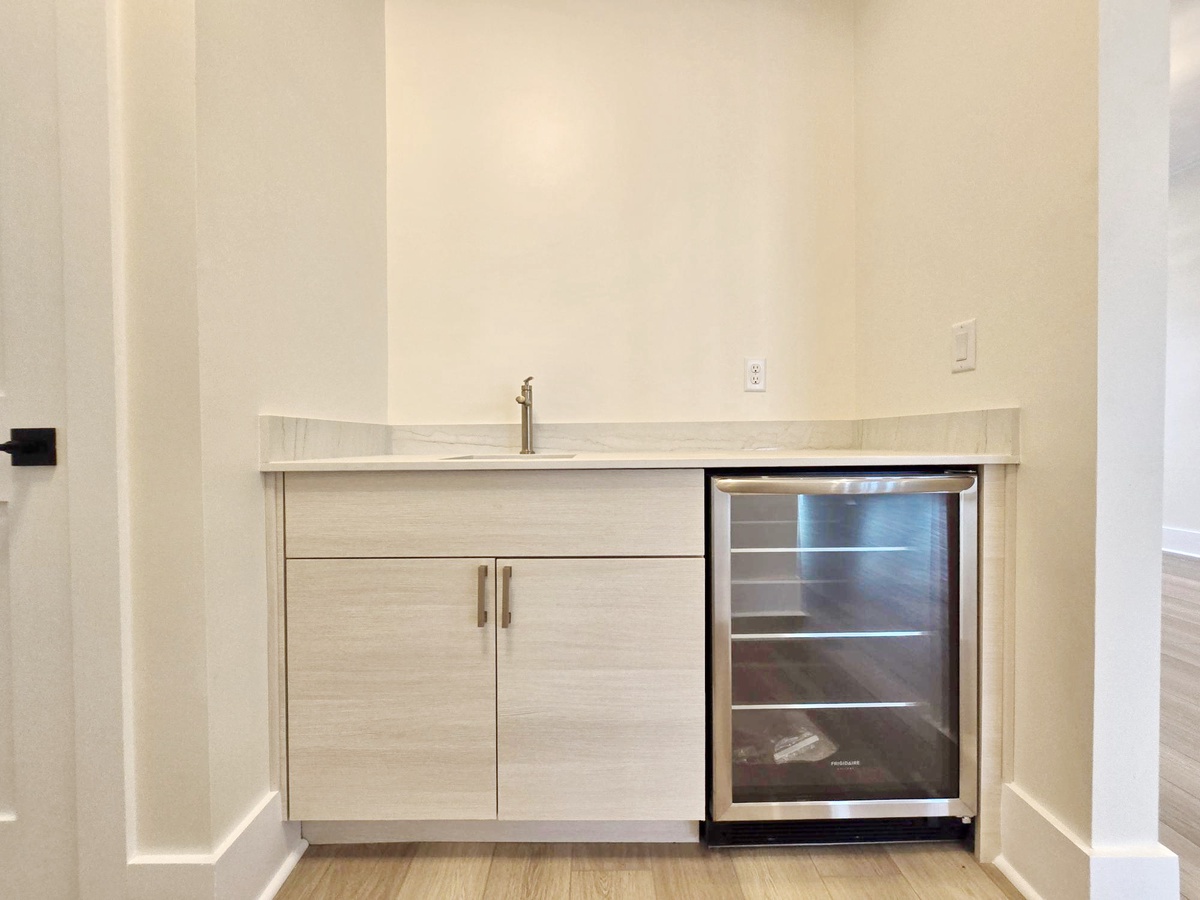 Your stylish wet bar offers the perfect spot to mix drinks and unwind after exploring.