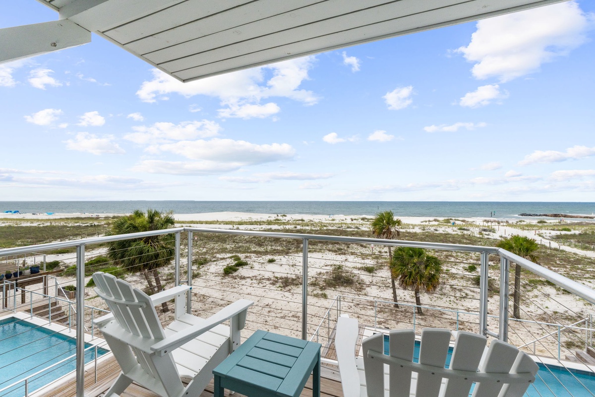 Sink into your Adirondack chair and let the rhythm of the waves set your pace. Your private terrace overlooks soft sands, swaying palms, and endless sea, giving you front-row seats to Gulf breezes and coastal calm.
