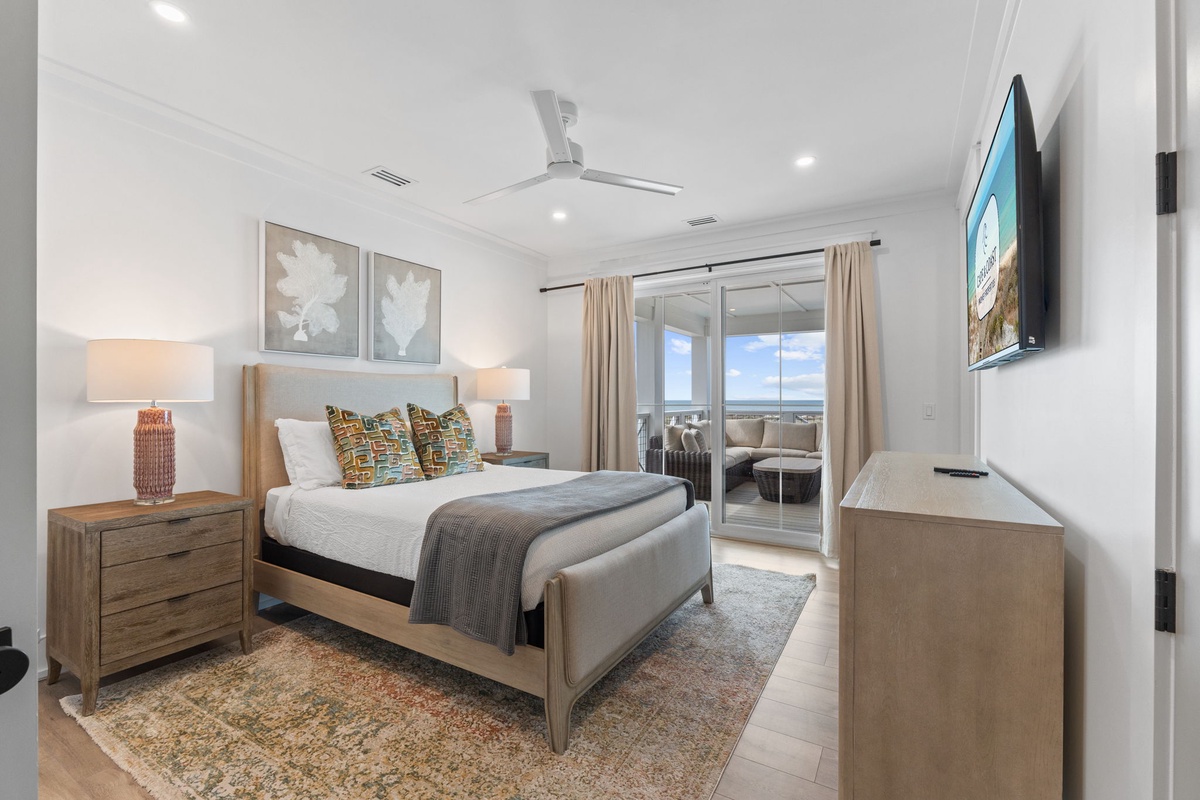 Wake up in your bright, modern bedroom with plush bedding and step out to your private balcony for morning coffee.