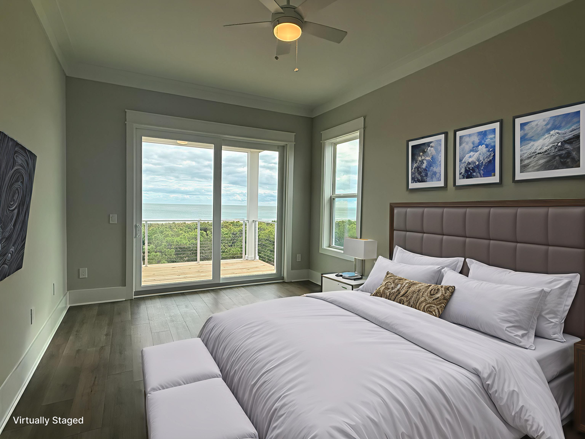 Rest peacefully in your serene bedroom featuring luxurious linens and a private balcony overlooking lush greenery.