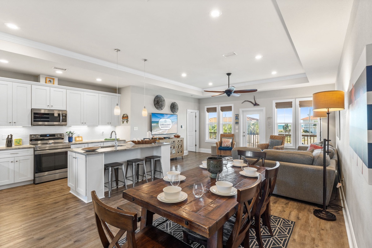 Your spacious open-concept living awaits with a fully equipped kitchen, elegant dining space, and comfortable seating area—perfect for creating memories.