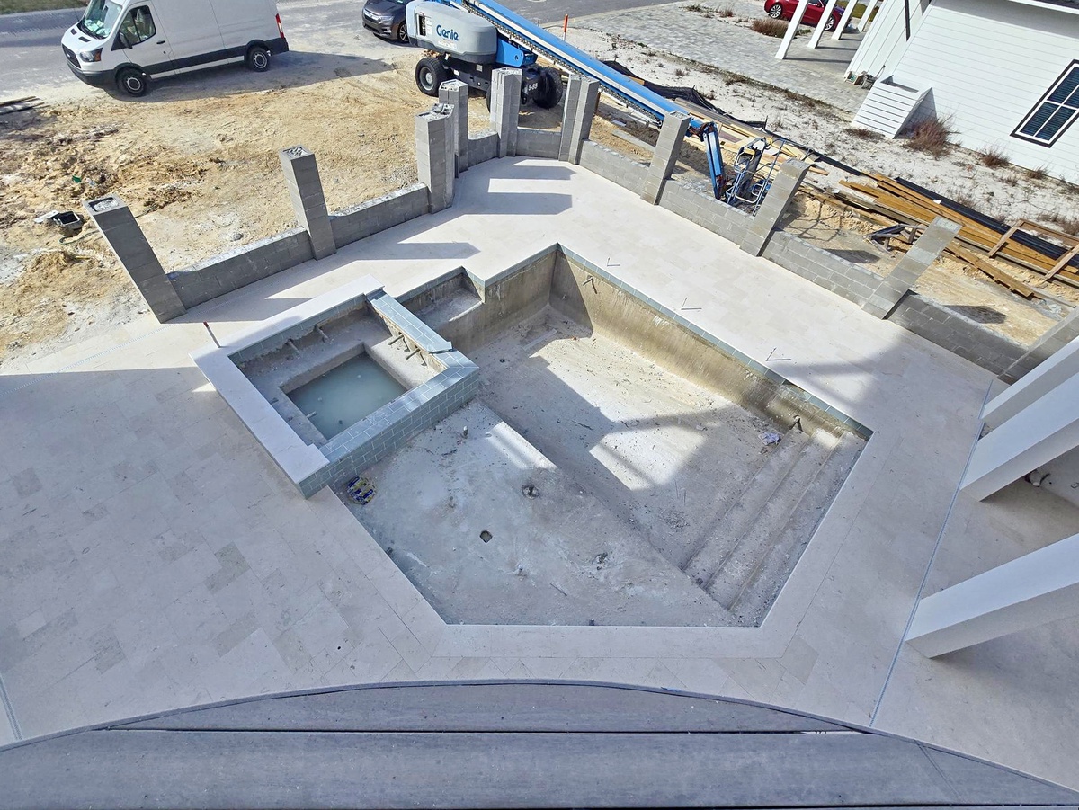 Construction site shows the early foundation stages of your future vacation retreat taking shape.