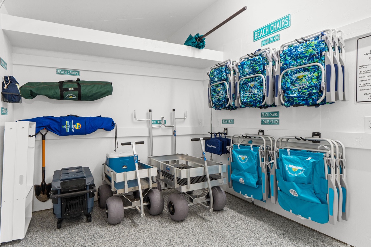 Your beach day essentials await in this organized gear room—grab chairs, umbrellas, and coolers for perfect seaside adventures.